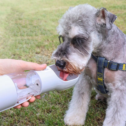 Cherry Pink 4-in-1 Portable Dog Water Dispenser+Food Storage+Built-in Poop Bag Holder+Scoop | 258ml Water & 220ml Food Capacity | Leakproof | Food-Grade ABS Material.